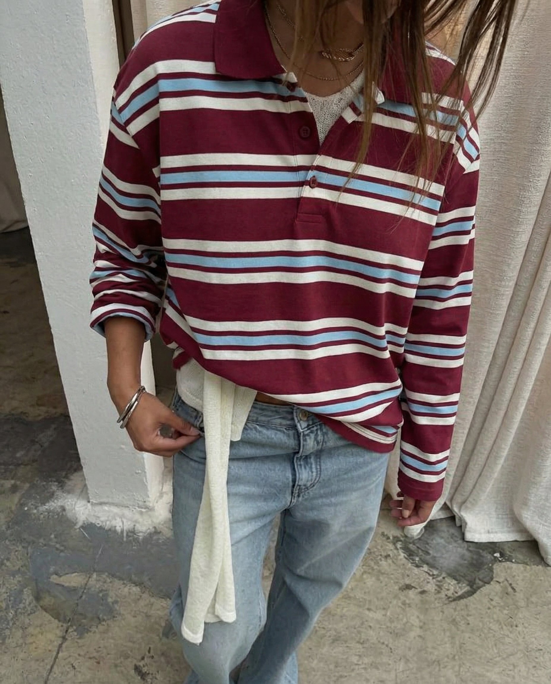 Polo manches longues col rayé