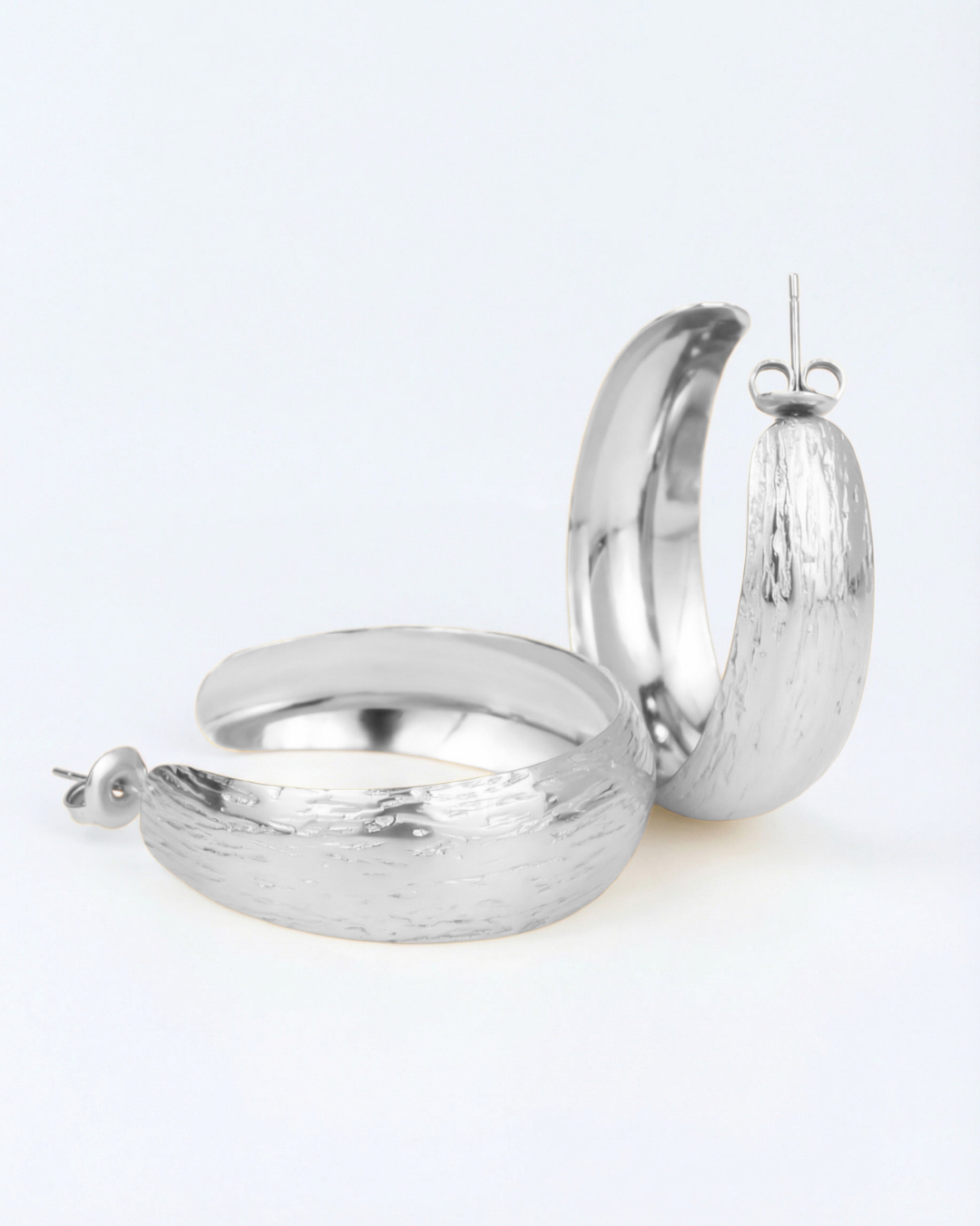 Carved hoop earrings