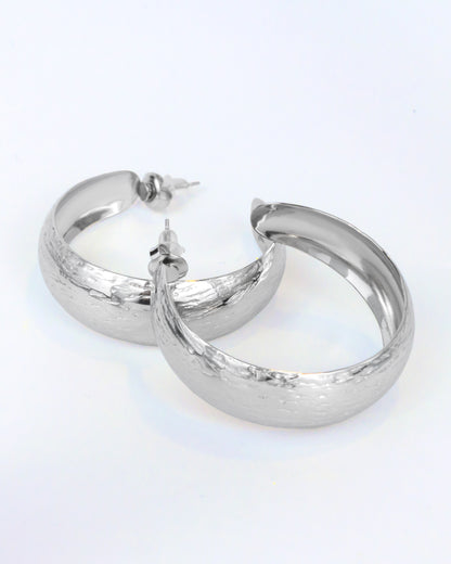 Carved hoop earrings