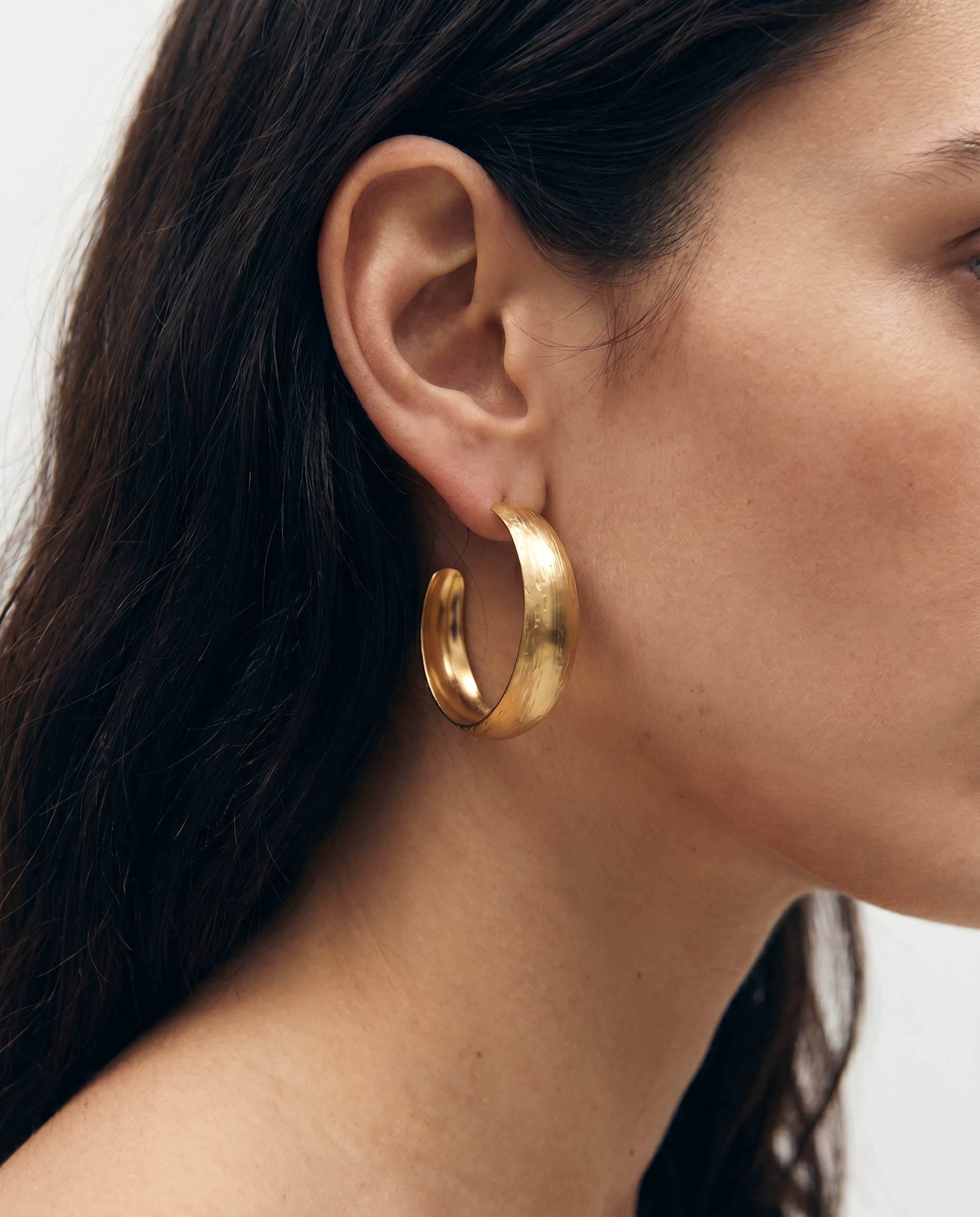 Carved hoop earrings